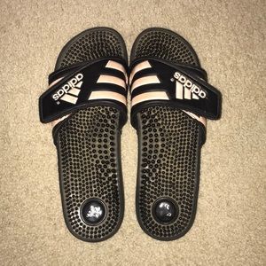pink and black adidas slides